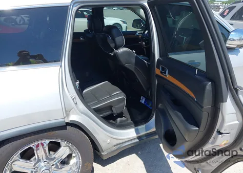 2013 Jeep Grand Cherokee Overland из США, поврежденный, VIN 1C4RJFCT2DC524008